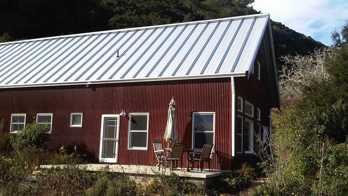 white-red-metal-roofing-siding-farmhouse